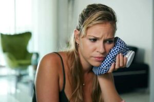 woman suffering from malocclusions or bad bites