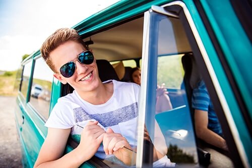 young man who learned how to have a good spring break with aligners